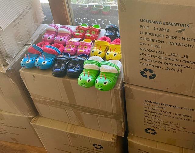 Boxes with colourful kids shoes